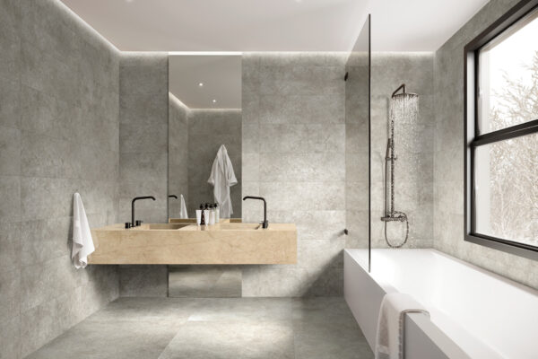 Badkamer aangekleed met vloertegels, merk Ragno, serie Richmond, stijl Stonelook.